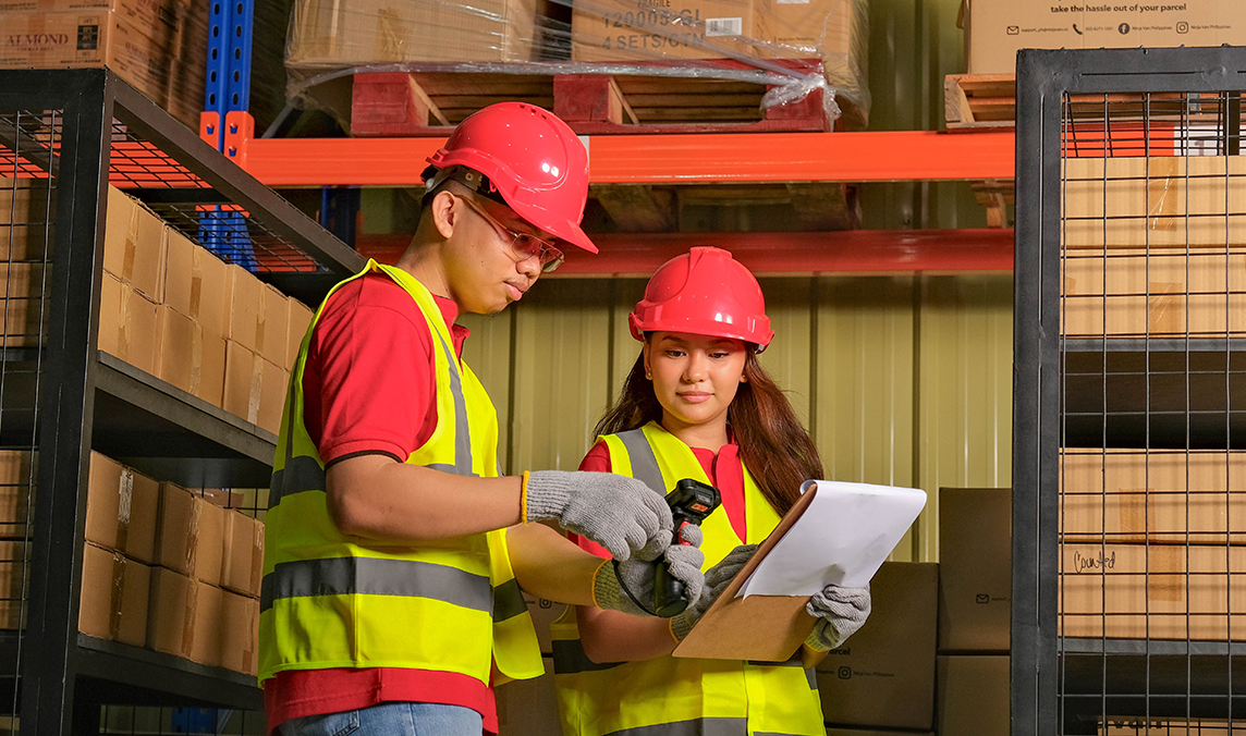 Man and woman checking inventory