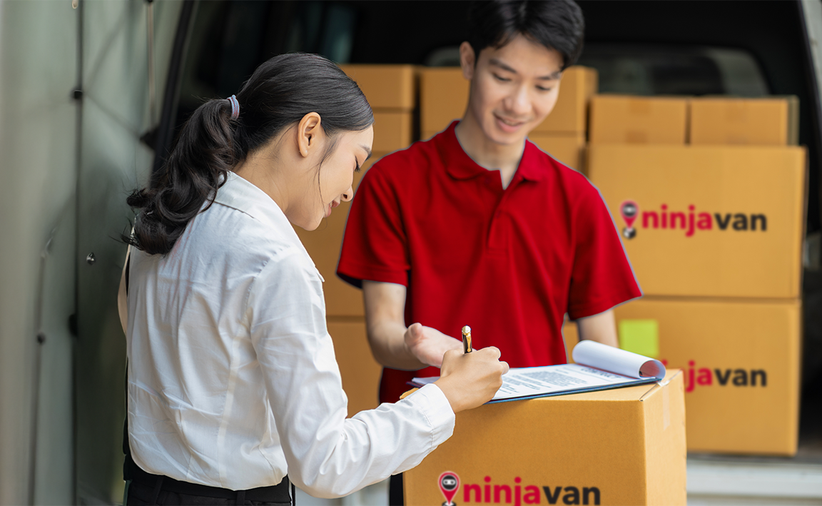 Woman checking inventory with man