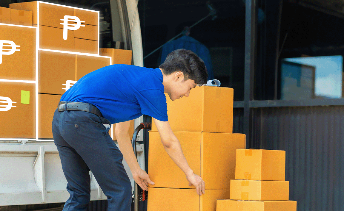 Man picking up parcels and loading them into truck.