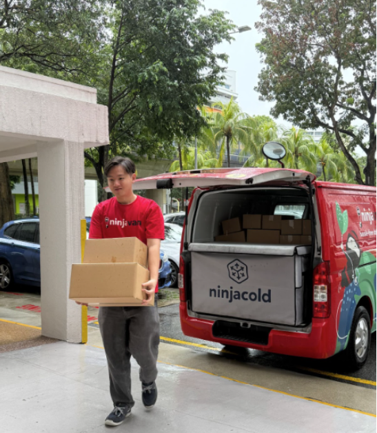 Ninja Van driver providing doorstep delivery of temperature-sensitive goods