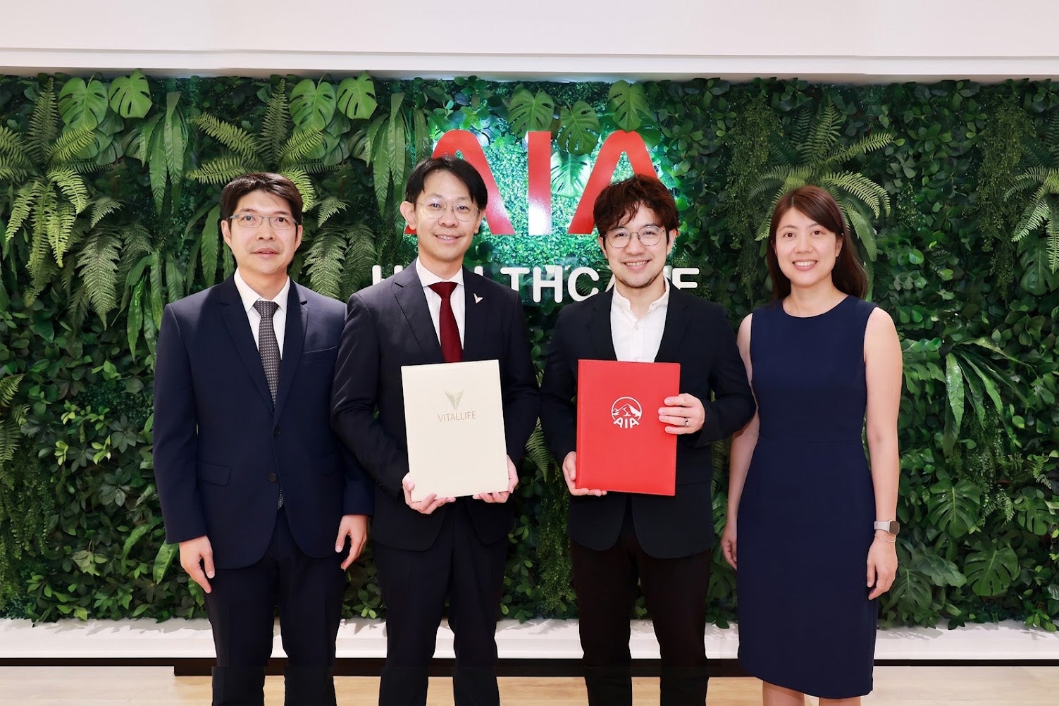 AIA and VitalLife executive partnership moment