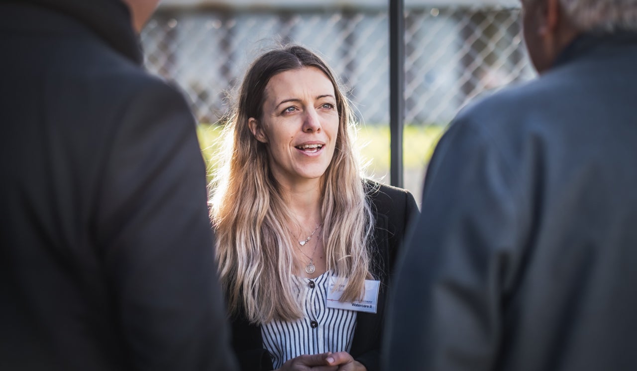 Stakeholder liaison advisor, Jennifer Charteris fields questions and talks with interested stakeholders about an infrastructure project in their community.