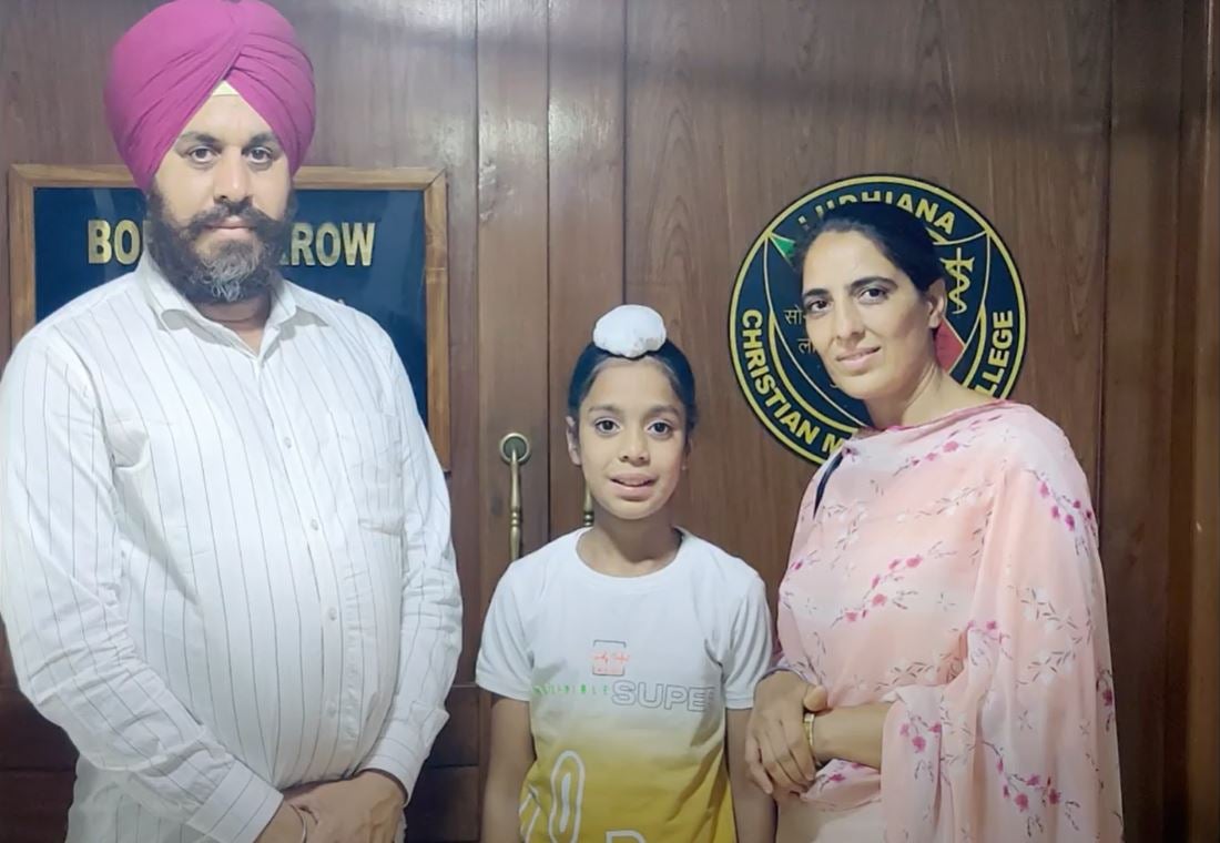 Bibek with his parents