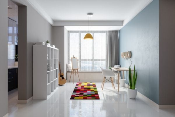 灰色、深藍的大地色系油漆，並作跳色設計的油漆牆面