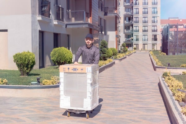 洗衣機搬運流程-以直立狀態搬運洗衣機