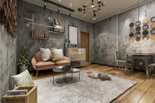 木地板搭配毛織地毯，牆面採清水模，並作金屬水管裝飾的書櫃。