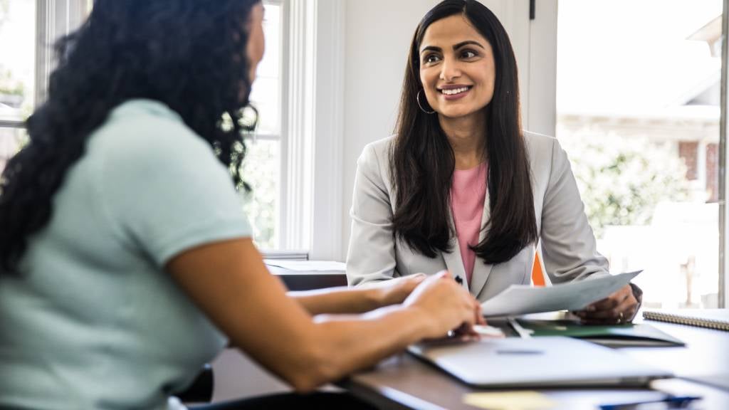 Woman prepares her will’s codicil with legal expert