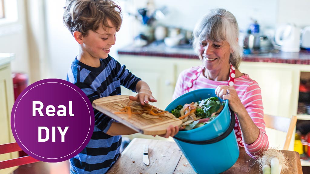 Young boy and his grandmother save kitchen scraps for compost