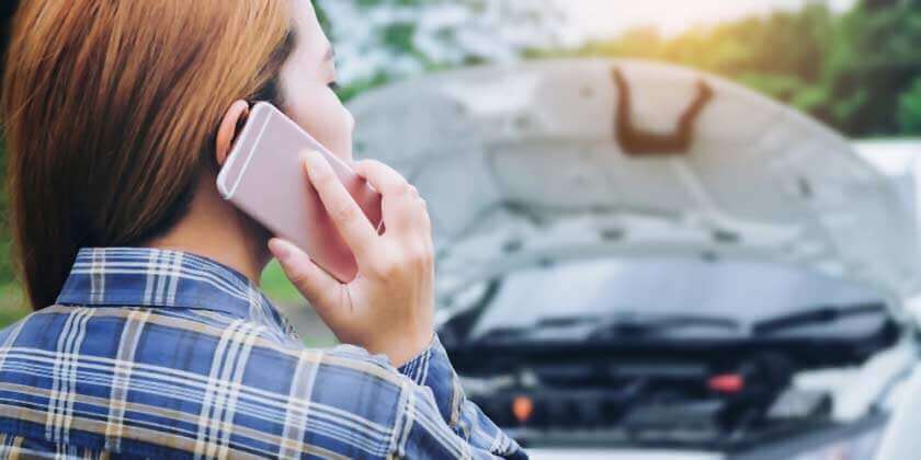 woman calling for roadside assistance