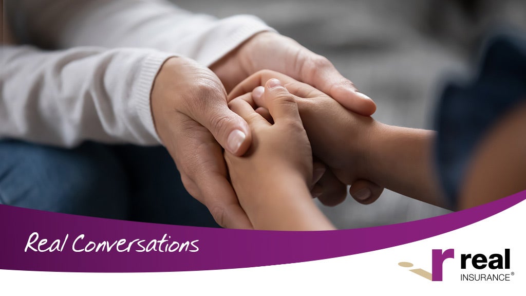 Mother and child hold hands (close up)