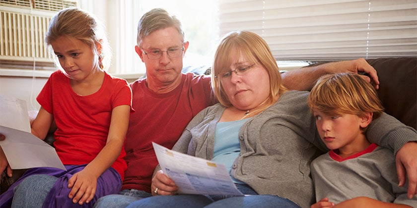 Australian family reading bills