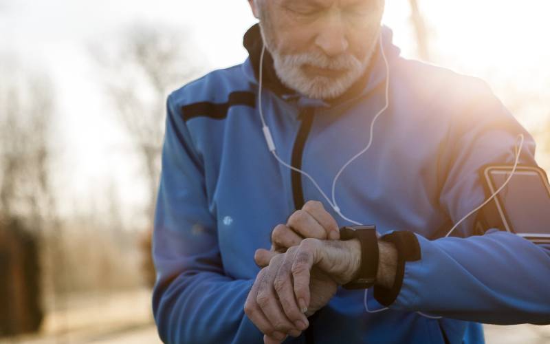 man in 50s jogging