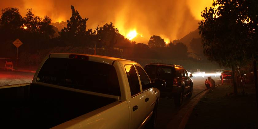 cars evacuating from fire