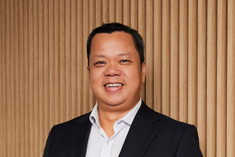 Headshot of educator Khang Huynh