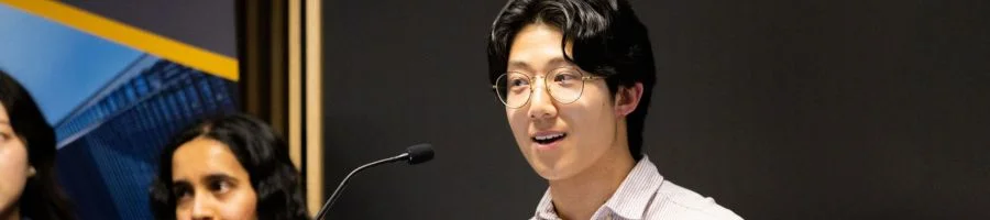 Man speaking into microphone.