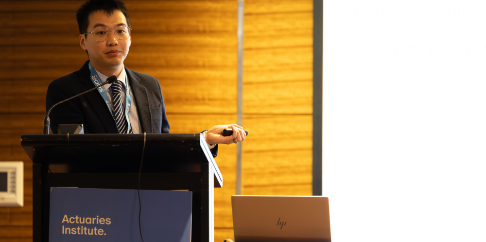 Garvin Tso presenting at the All Actuaries Summit 2025.