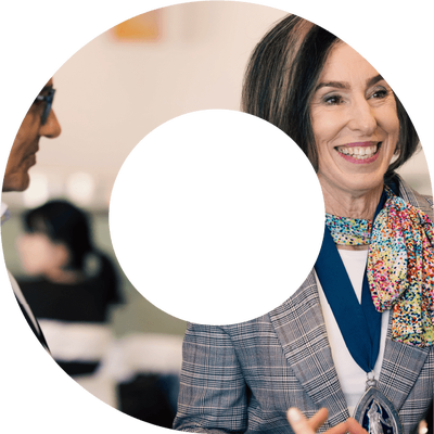 Actuaries celebrating together at an event within viewfinder cut-out