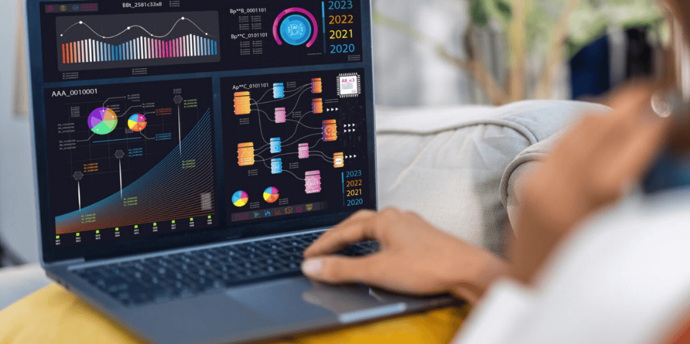 A person with a hand typing in a computer