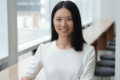 Headshot of Fei Huang.