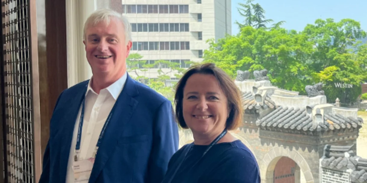 A photo of Institute CEO Elayne Grace and 2024 Institute President David Whittle in Asia.