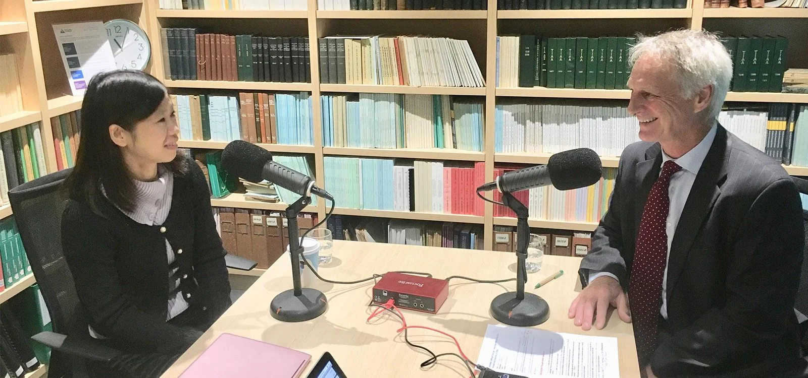Iris with Paul Swinhoe recording a podcast for the Actuaries Institute