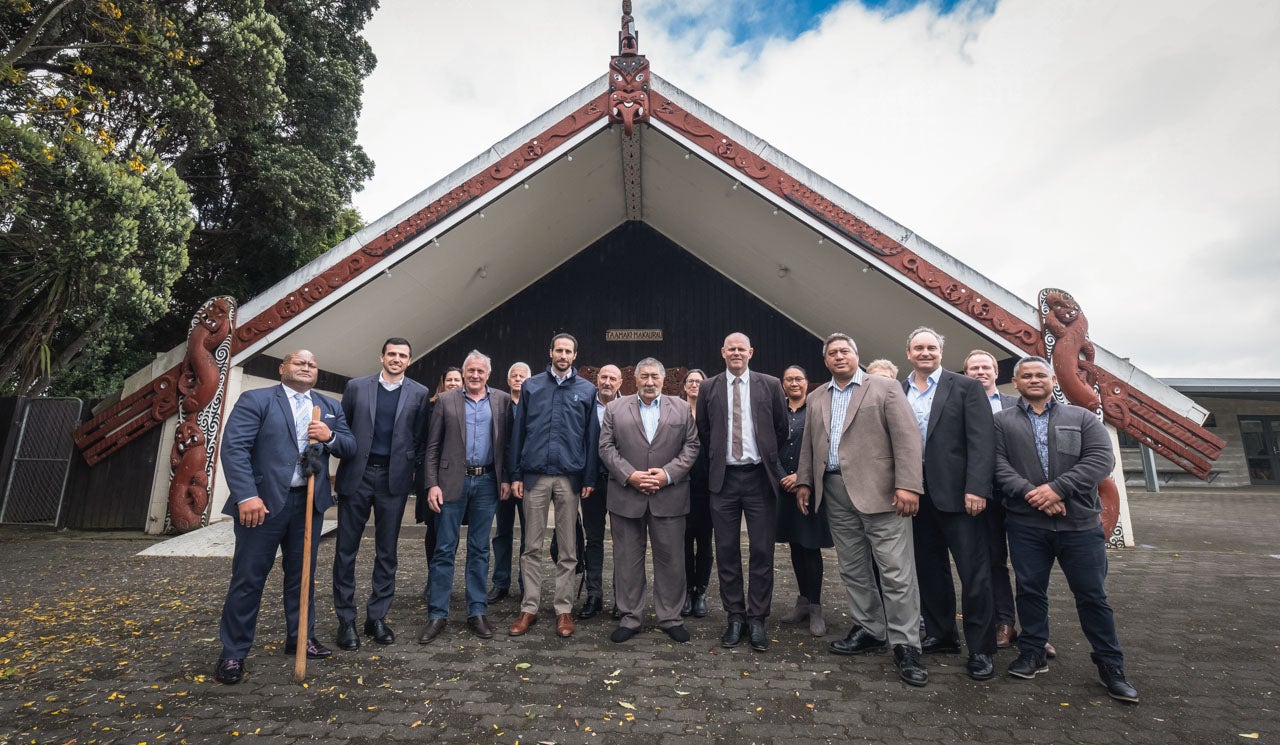 Principal Advisor Richie Waiwai is pictured with visitors, guests, project stakeholders and Watercare staff on a marae.