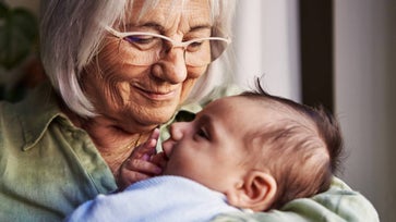 Grandmother with newborn grandchild.