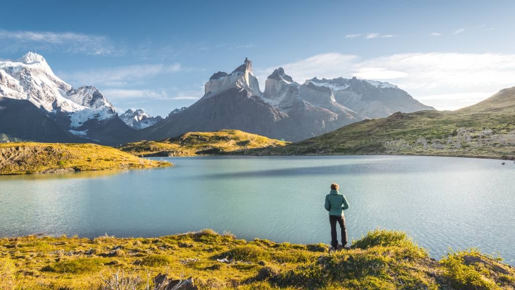 Man admires Torres del Paine National Park, Chile.