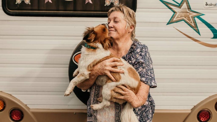 Thalidomide survivor Gaylene Seeney with her dog Albert. 