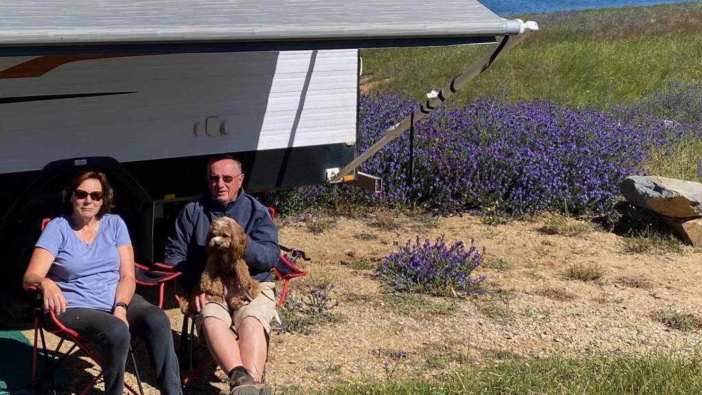 A photo of Graham and Wendy French, who have spent the past three decades traversing Australia on the hunt for trains.
