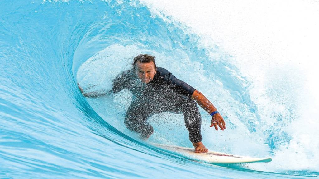 Tim Baker pictured surfing