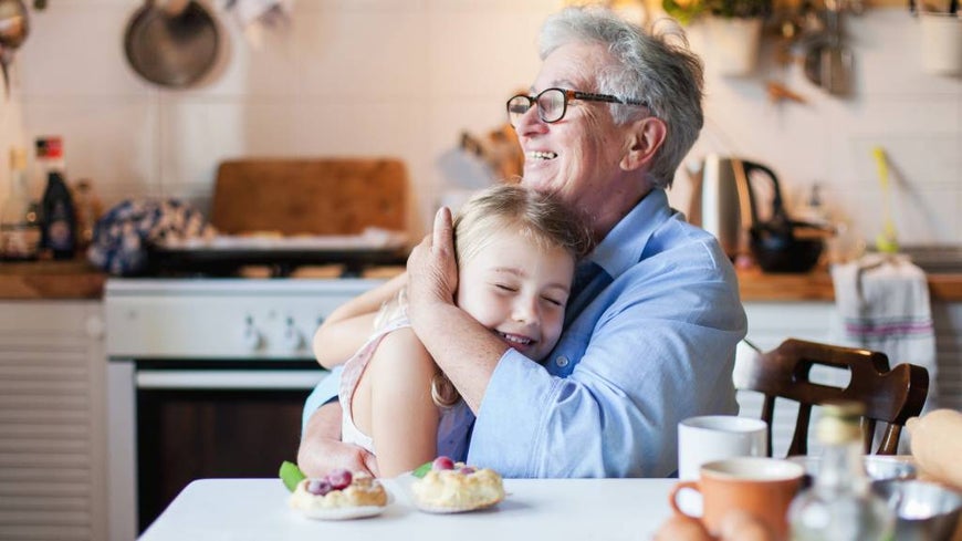 grandparent hugging grandkid