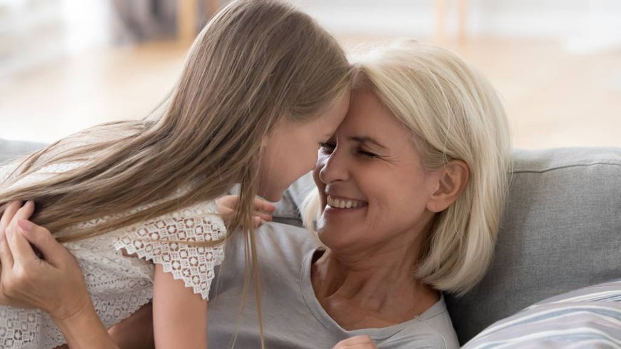 grandmother enjoying life at home with grandaughter