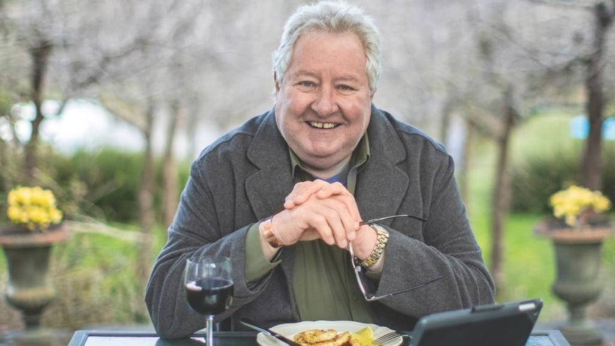 Actor John Woods sits down for an al fresco meal