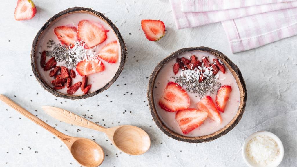 Chia seeds and fruit in yoghurt bowls