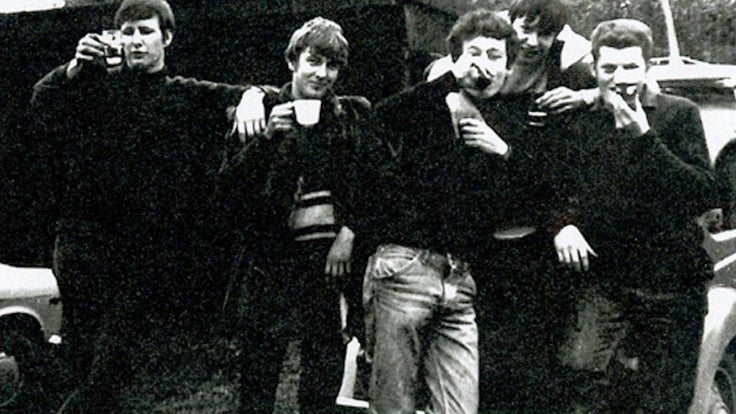 LLoyd Goodman and his friends in old black and white photo.