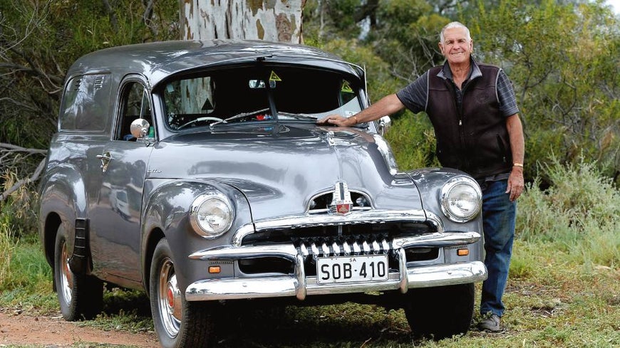 Maurice “Mozzie” McMahon poses with his restored 1954 FJ Holden panel van in Port Augusta, South Australia.