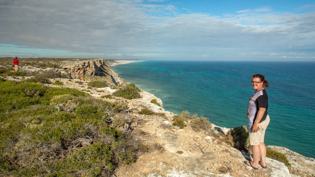 enior woman looks out at the ocean from South Australia's Great Australian Bight