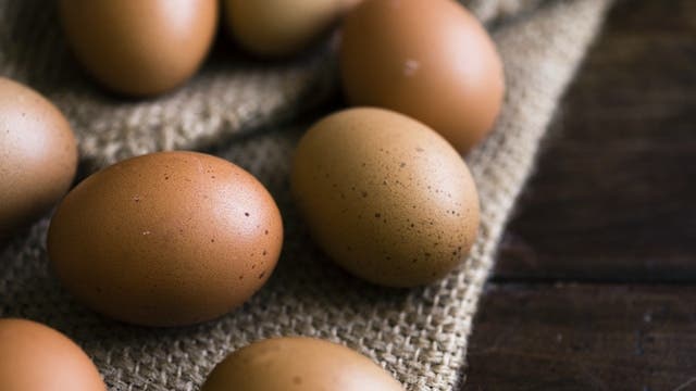 Few eggs on a brown cloth