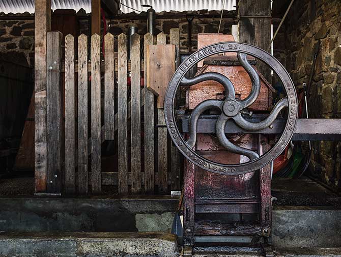 Vintage wine press wheel