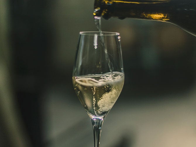 Sparkling wine pouring