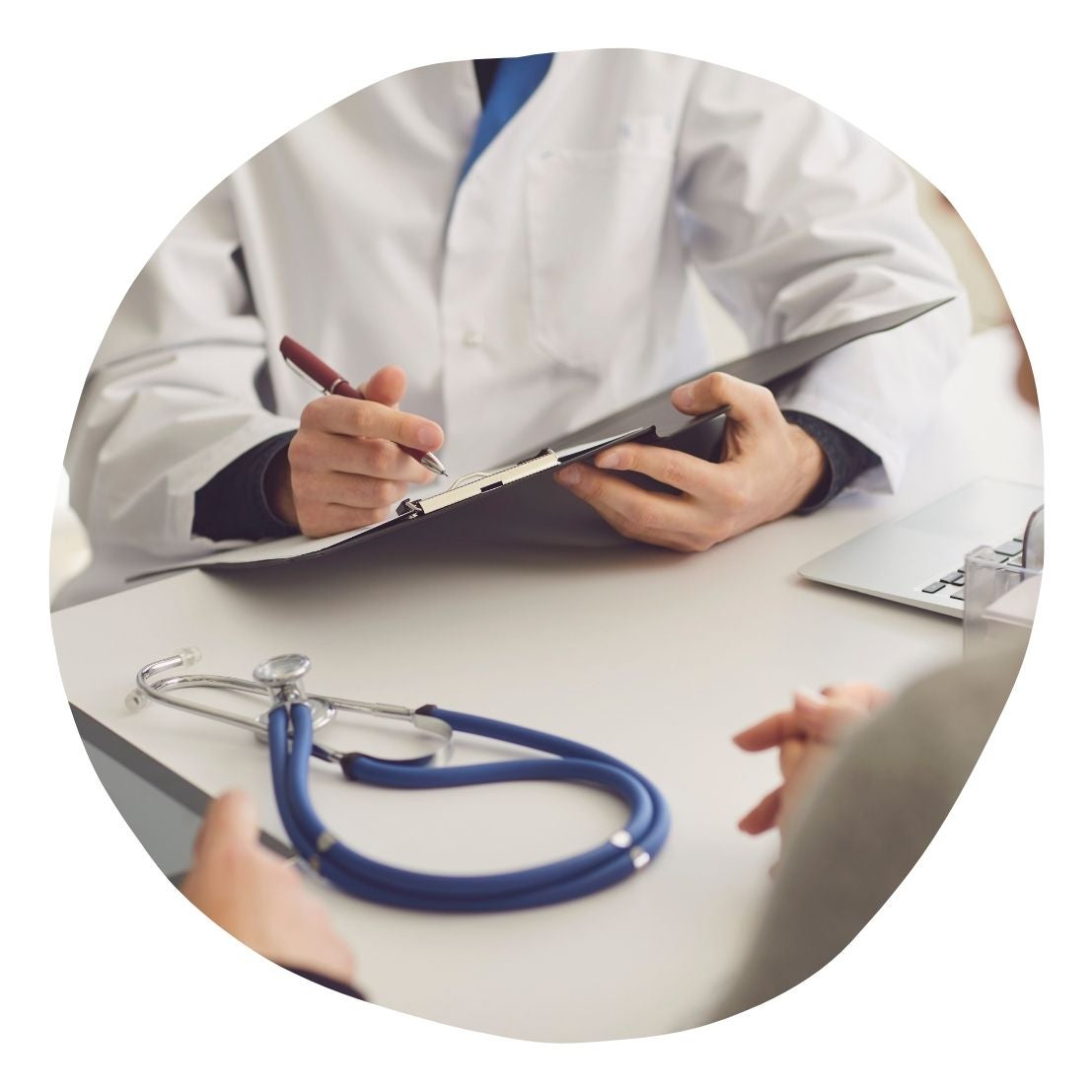 Circular image of a GP hands and GP tools, in clinic with a client 