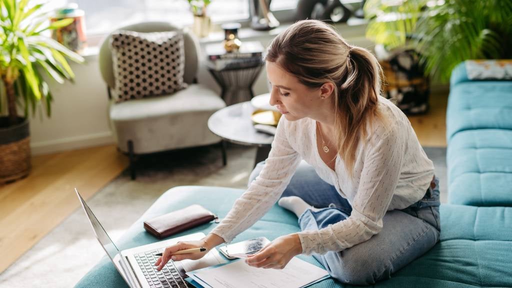 Woman works from home on laptop