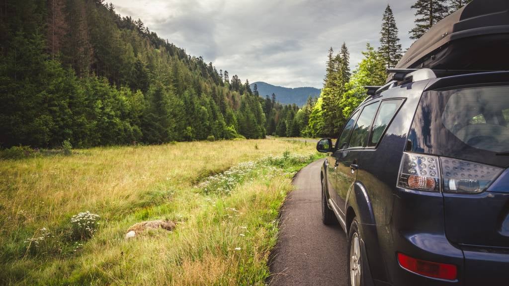 Car drives through the mountains