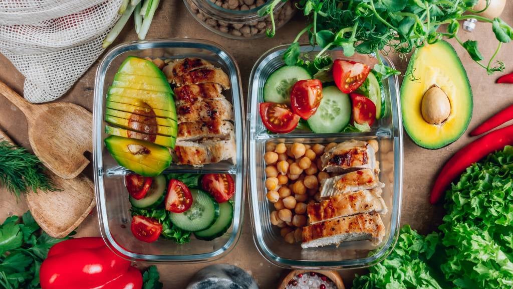 Healthy meal prep containers on kitchen bench