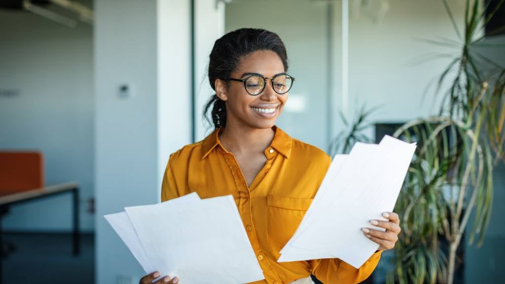 Woman reviews documents 