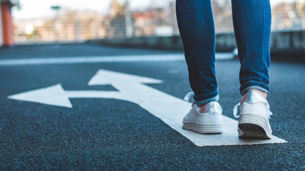 standing at intersection on road