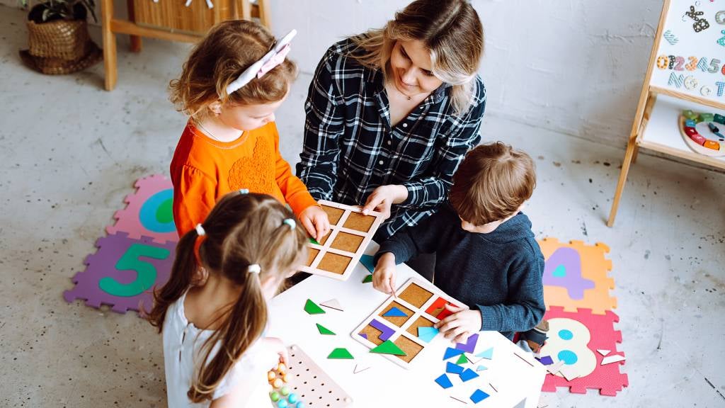 Children and teacher at early childhood education centre