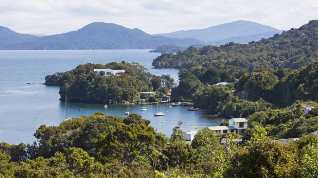 View from Observation Rock over Golden Bay to Paterson Inlet and the hills of Rakiura National Park