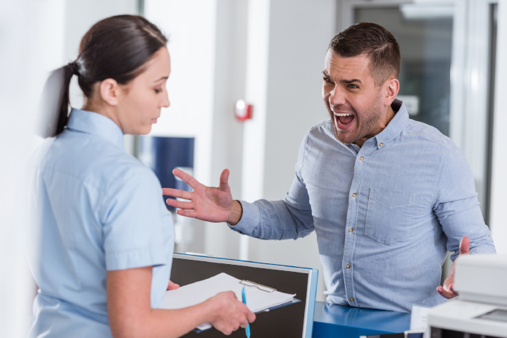 Patient seen to be yelling at worker